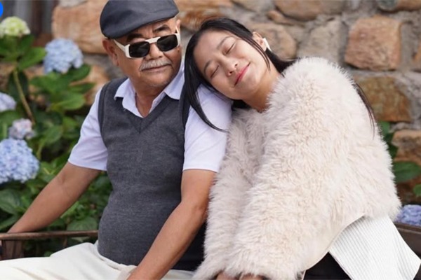 Bạn gái kiêm quản lý NSND Việt Anh